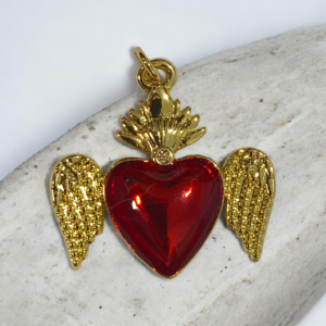 Dije corazón con alas